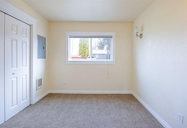 200 N Ave W, Missoula, MT 59801 - unfurnished bedroom with electric panel, visible vents, baseboards, a closet, and carpet floors
