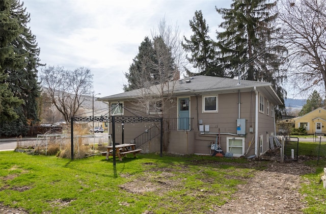 200 N Ave W, Missoula, MT 59801 - back of house with a yard and fence