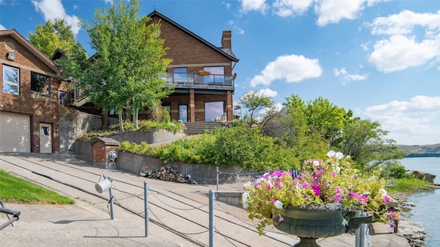 exterior space with a water view