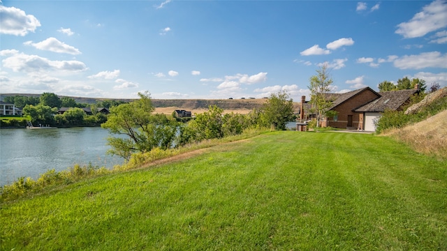 view of yard with a water view