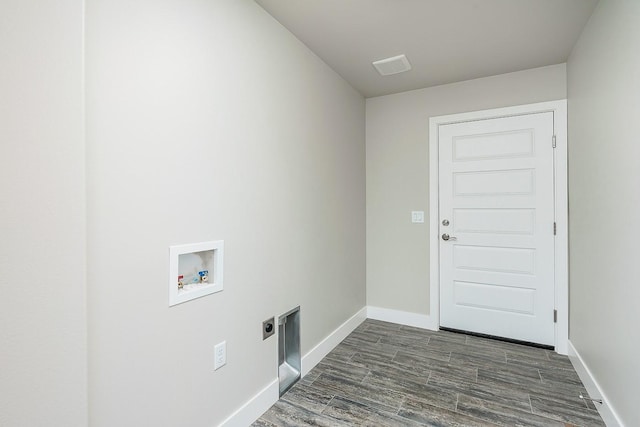 clothes washing area with washer hookup, dark hardwood / wood-style floors, and hookup for an electric dryer