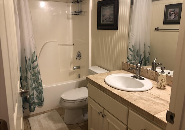 full bathroom with tile patterned floors, vanity, toilet, and shower / bath combo with shower curtain