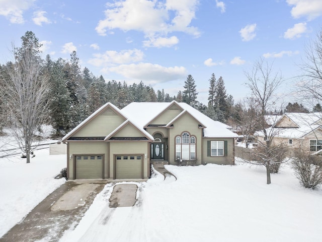 single story home featuring a garage