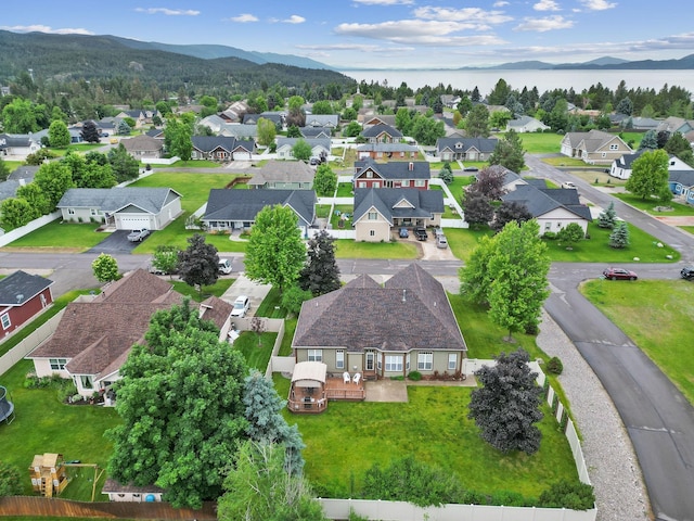 birds eye view of property with a mountain view