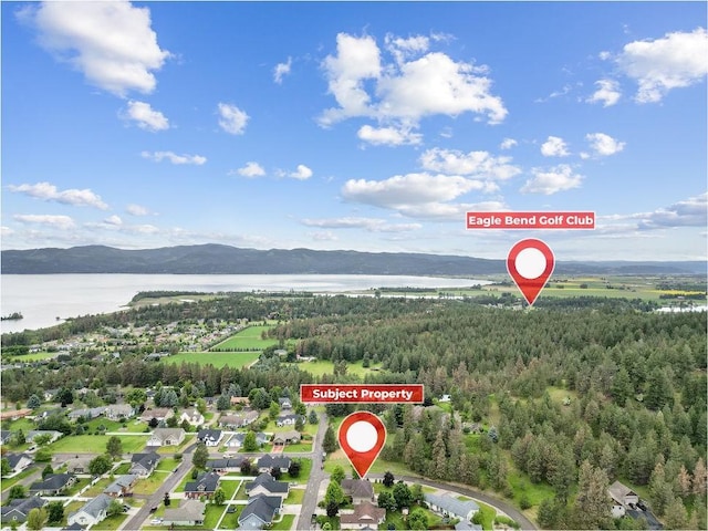 aerial view with a water and mountain view