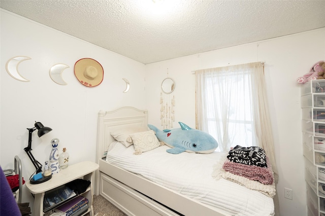 bedroom with a textured ceiling