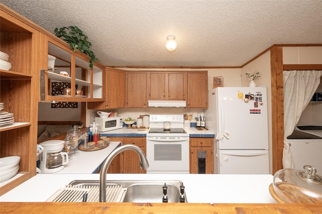 kitchen featuring a textured ceiling, white appliances, sink, and ornamental molding