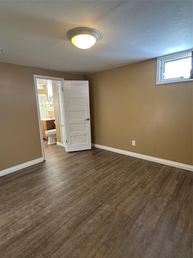 empty room featuring dark hardwood / wood-style floors