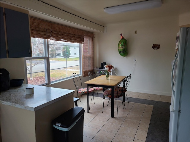 view of tiled dining space