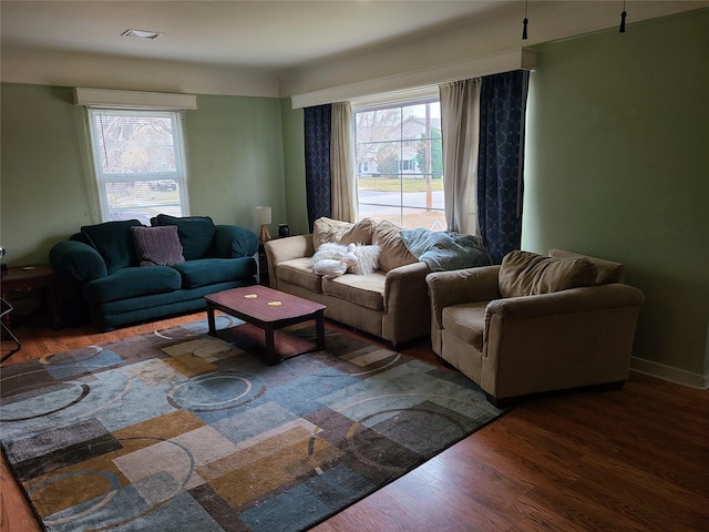 living room featuring dark hardwood / wood-style flooring