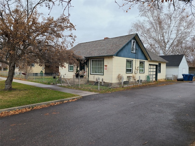 view of front of home with a front lawn