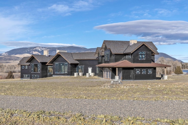 view of front of house with a mountain view