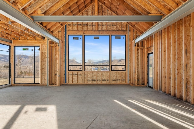 interior space featuring a mountain view and a healthy amount of sunlight