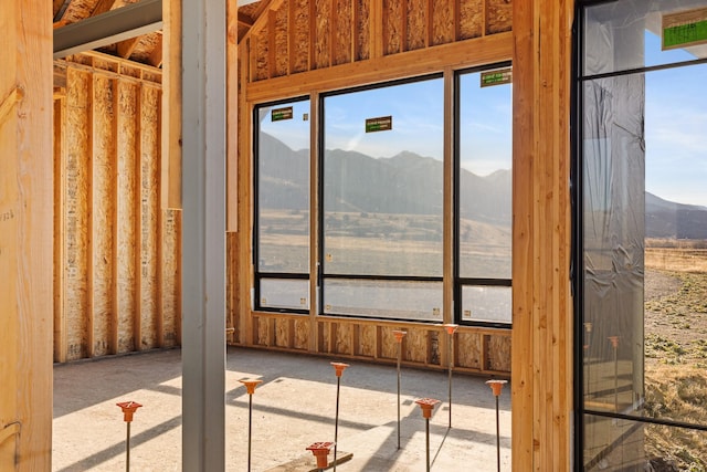 exterior space featuring a mountain view and a healthy amount of sunlight