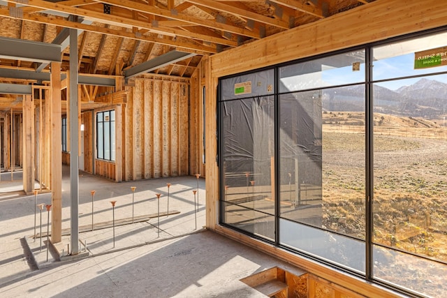 miscellaneous room with a mountain view