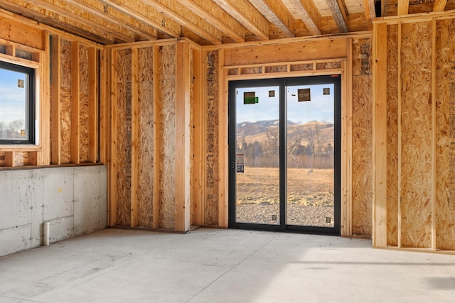 miscellaneous room with a mountain view