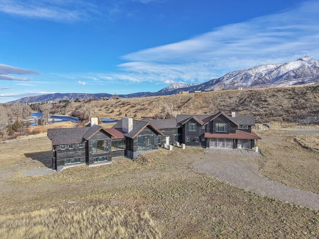 view of front of house featuring a mountain view