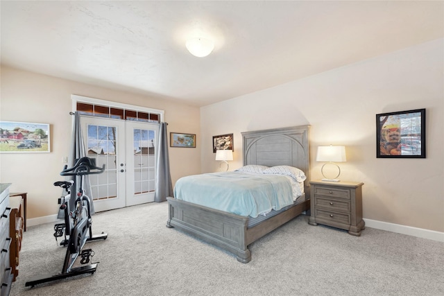 bedroom with access to outside, light carpet, and french doors