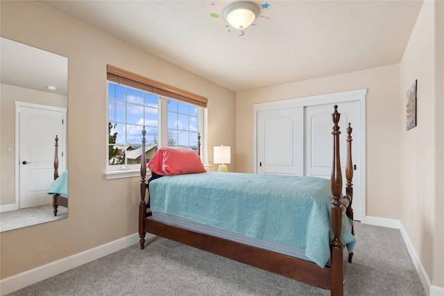 carpeted bedroom featuring a closet