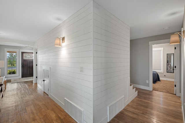 corridor featuring hardwood / wood-style flooring