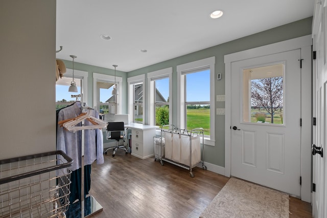 doorway to outside featuring hardwood / wood-style flooring