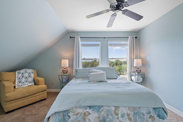 carpeted bedroom featuring ceiling fan and vaulted ceiling