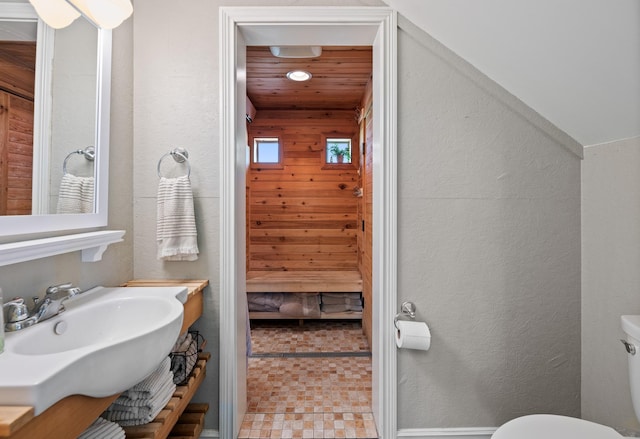 bathroom with toilet and sink