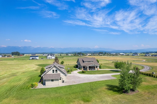 aerial view with a mountain view and a rural view