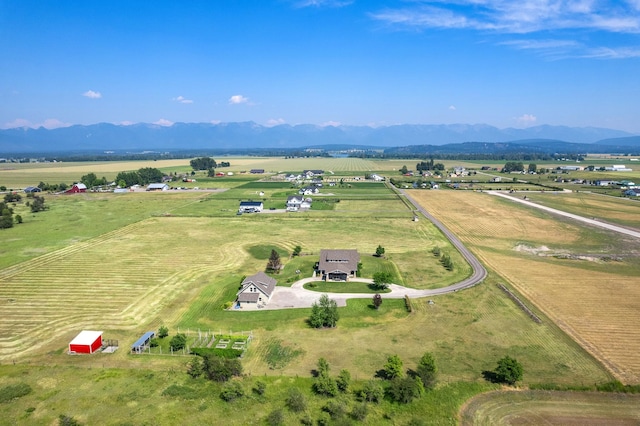 aerial view featuring a mountain view and a rural view