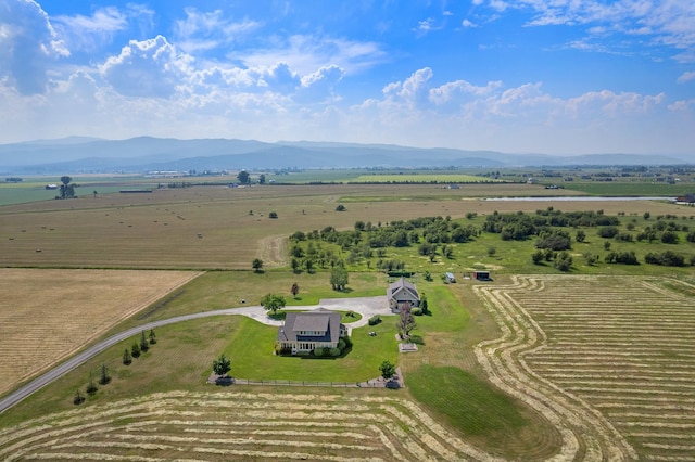 bird's eye view with a mountain view and a rural view