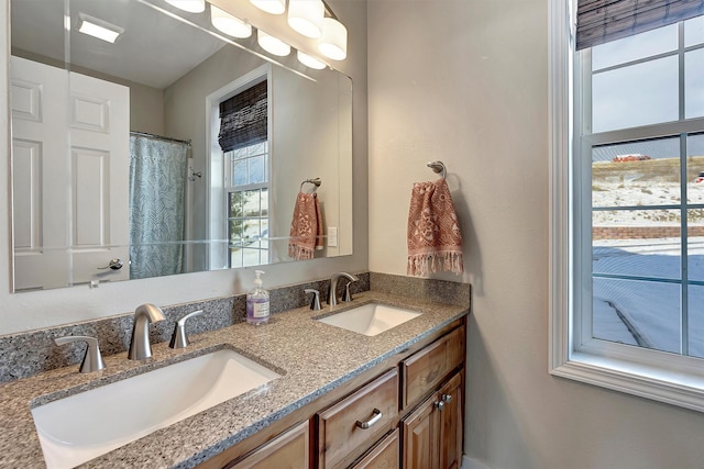 bathroom featuring vanity and walk in shower