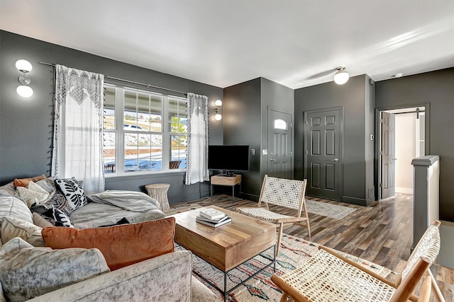 living room with hardwood / wood-style floors