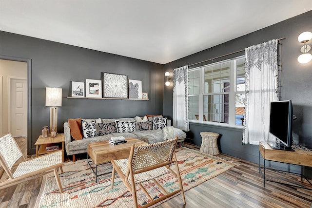 living room with wood-type flooring