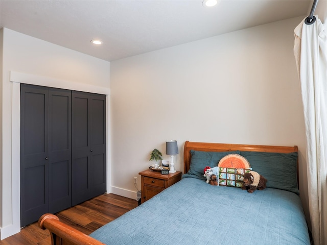 bedroom featuring dark hardwood / wood-style floors