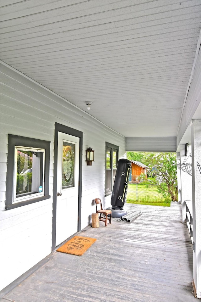 wooden deck featuring a porch