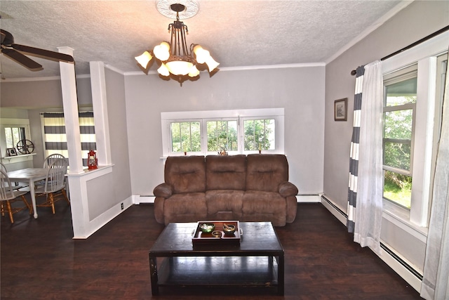 living room featuring a baseboard radiator, a textured ceiling, and ornamental molding