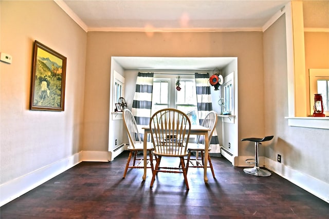 dining space with dark hardwood / wood-style floors, ornamental molding, and baseboard heating