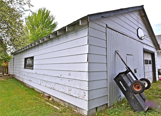 view of property exterior with an outdoor structure