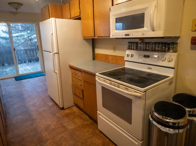 kitchen featuring white appliances