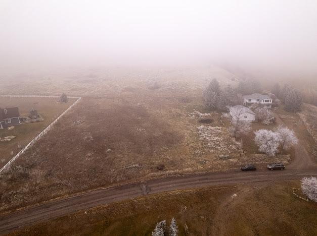 bird's eye view with a rural view