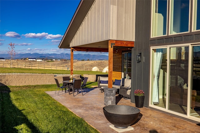 view of patio with a mountain view and a rural view