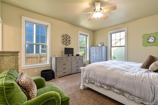 carpeted bedroom with ceiling fan