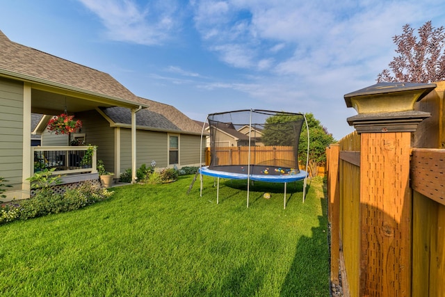 view of yard with a trampoline