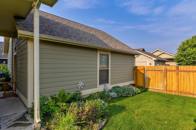 view of home's exterior featuring a lawn