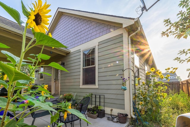 view of property exterior featuring a patio