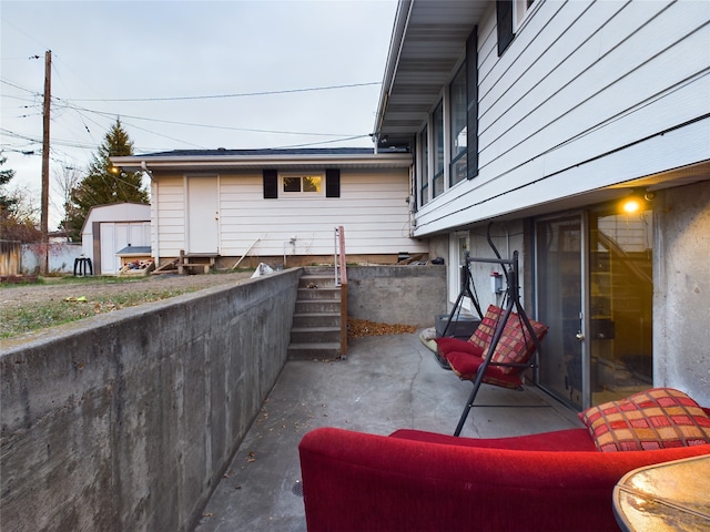 view of patio with a shed