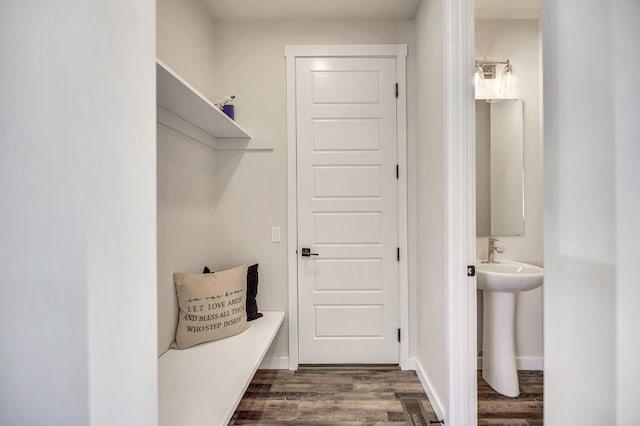 mudroom featuring dark hardwood / wood-style floors and sink