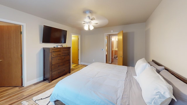 bedroom featuring light hardwood / wood-style flooring and ceiling fan