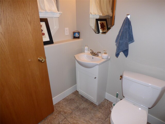 full bathroom with shower / bath combo, toilet, and vanity