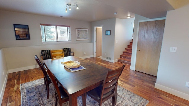 dining area featuring hardwood / wood-style flooring